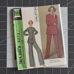 May include: McCall's sewing pattern envelope for a misses' unlined jacket and pants. The pattern is number 4273 and is designed by Halston. The envelope features two models wearing the garment in different colors.