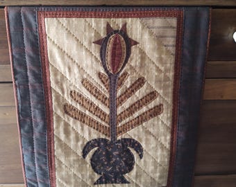 Folk Art Flower, a Primitive Applique Wall Hanging from a Linda Brannock  Pattern