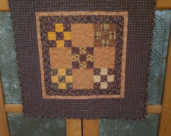 Plums and Cheddar, a Scrappy 9 patch Halloween Decorative Quilt