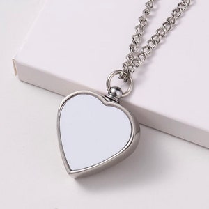 Hjärturnhänge: Silverfärgad sublimeringsurnhållare med blank askhållare