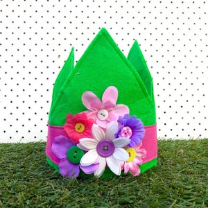 Corona floral verde y rosa
