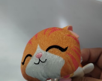 Squishmallow GG atigrado naranja de 5 pulgadas