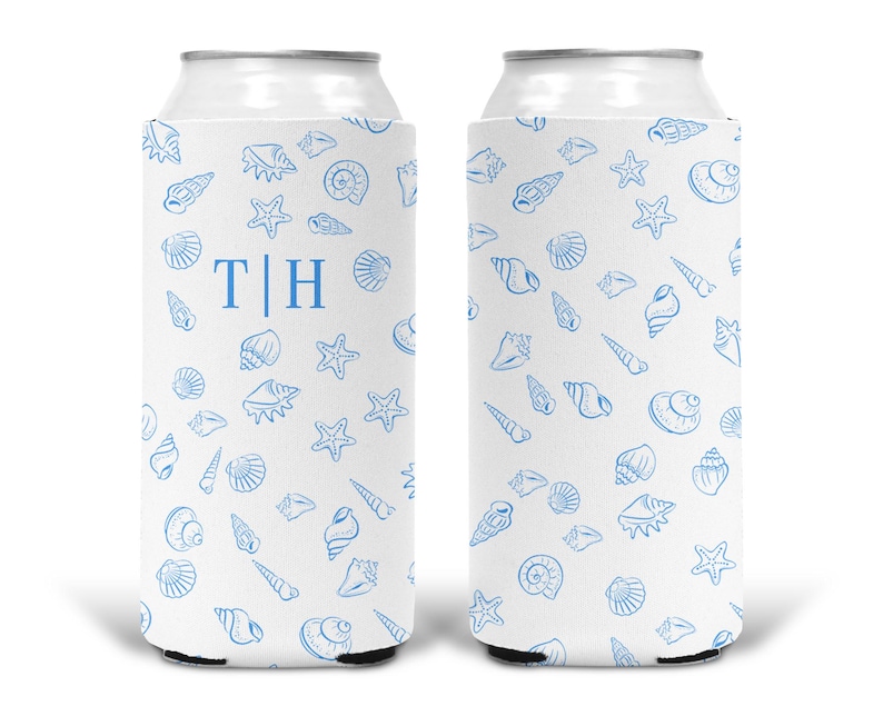 May include: Two white foam can coolers featuring a repeating pattern of light blue seashells and starfish. The left cooler displays the letters T and H separated by a vertical line in a blue serif font, while the right cooler shows the pattern.