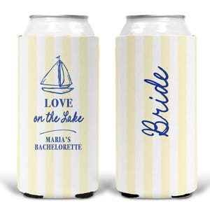 May include: White and yellow striped can cooler with blue text and sailboat graphic. One side reads "Love on the Lake, Maria's Bachelorette". The other side says "Bride".