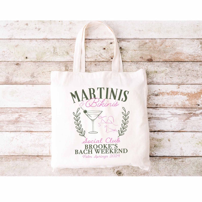 May include: White canvas tote bag with a green and pink design that says "Martini's & Bikinis Social Club Brooke's Bach Weekend Palm Springs 2024".