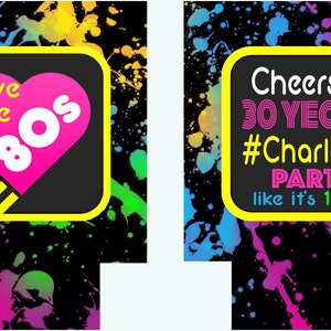 May include: Two black and yellow can coolers with a neon paint splatter design. One cooler says "I love the 80s" with a pink heart and the other says "Cheers to 30 years #Charlotte Party like it's 1989".