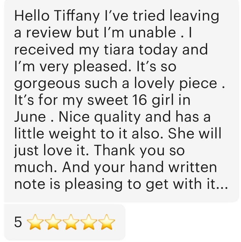 May include: A customer review with text praising a tiara, mentioning its quality and appeal. The review is accompanied by a five-star rating, indicating high satisfaction with the product.