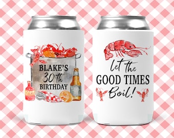 May include: Two white can coolers with a red crawfish design. One cooler says "Blake's 30th Birthday" and the other says "Let the good times boil!"