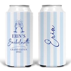 May include: Two can coolers with a light blue and white striped pattern. One cooler has the text "Erin's Bachelorette" with champagne glasses and "Grand Haven 2025". The other cooler has the name "Erin" in a script font.