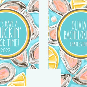 May include: Two designs with a light blue background featuring oysters and lemon slices. One design has the text "LET'S HAVE A SHUCKIN' GOOD TIME! 2022" in a teal circle. The other says "OLIVIA'S BACHELORETTE CHARLESTON, SC".