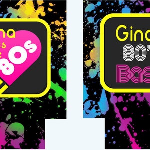 May include: Two black and yellow square signs with a neon paint splatter background. The first sign says "Gina loves the 80's" with a pink heart and white 80's inside. The second sign says "Gina's 80's Bash" with white and pink 80's and Bash.