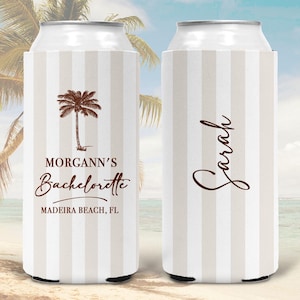 May include: Two can coolers with a striped pattern in beige and white. One cooler has the text "MORGANNN'S BACHELORETTE MADEIRA BEACH, FL" with a palm tree graphic. The other cooler has the name "Sarah" in a script font.