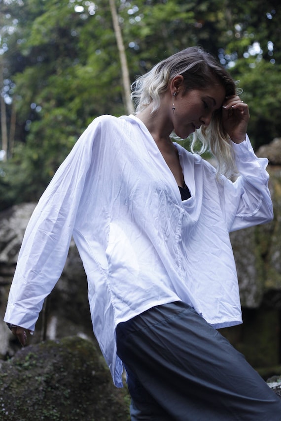 white loose fitting blouse