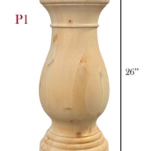 May include: A natural wood table base with a turned design. The base is 26 inches tall and 10 inches in diameter.