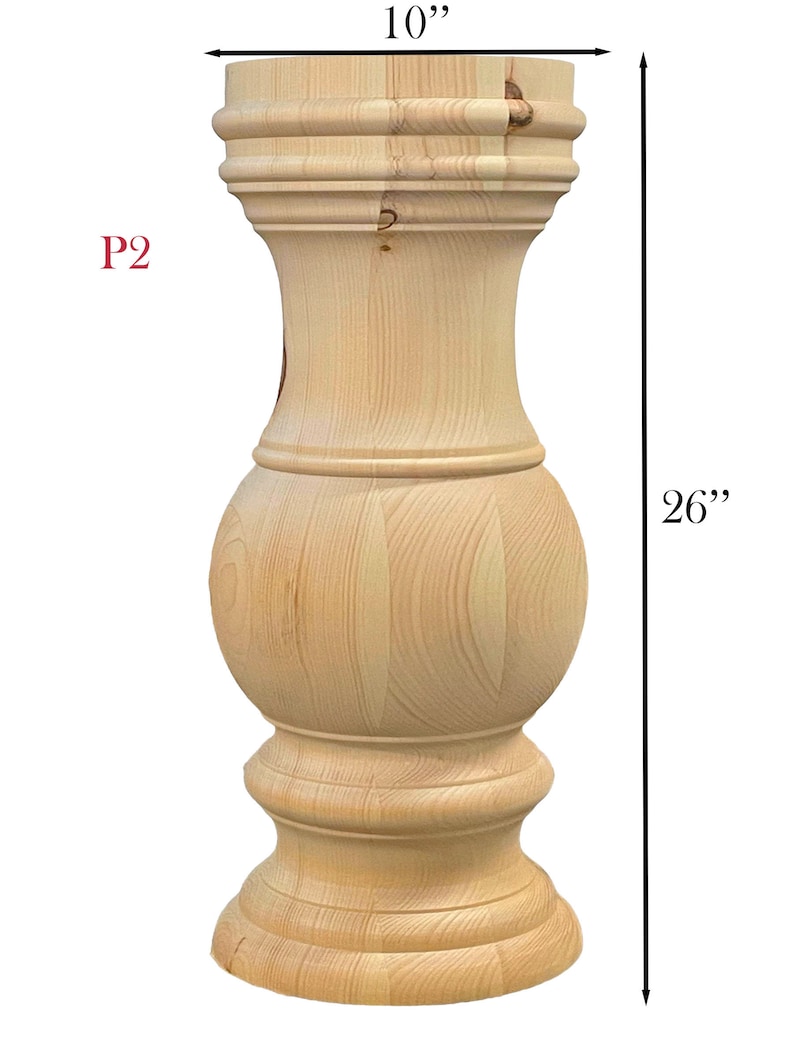 May include: A natural wood table leg with a turned design. The leg is 26 inches tall and 10 inches wide. P2.