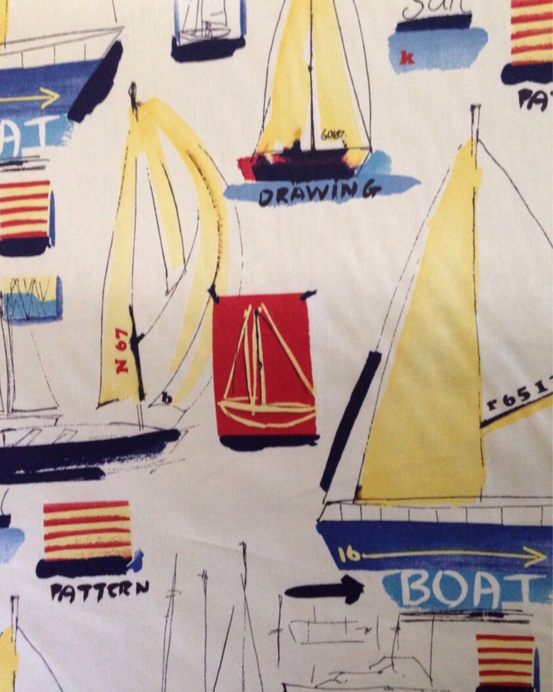 May include: A white fabric with a repeating pattern of colorful sailboats. The sailboats are drawn in a whimsical style with yellow, red, blue, and black lines. The fabric has the words "Drawing", "Boat", and "Pattern" written on it.