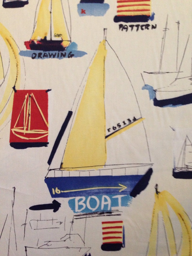 May include: A white background with a yellow, blue, and black sailboat illustration. The sailboat has a yellow sail and a blue hull. The words "BOAT" and "16" are written on the hull. The words "r 65134" are written on the sail. The words "DRAWING" and "PATTERN" are written on the background.