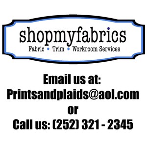 May include: A white rectangular sign with a black and blue border featuring the black text shopmyfabrics, Fabric, Trim, Workroom Services. Below this, black text reads Email us at: Printsandplaids@aol.com or Call us: (252) 321 - 2345.