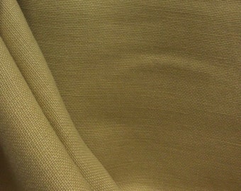 May include: A close-up of a piece of brown canvas fabric with a textured weave.