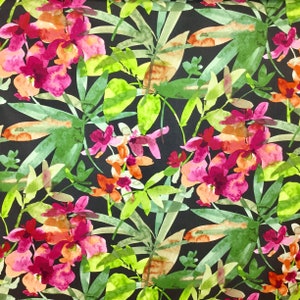 May include: A watercolor print fabric featuring a tropical floral pattern with pink, orange, and green flowers on a black background.
