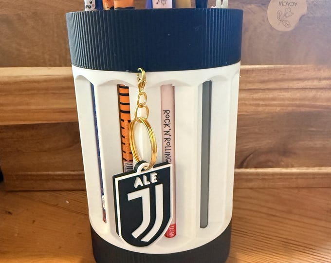 Legami Milano revolving pen holder with personalized team keychain