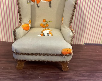 1/12 dolls house scale Wingbacked armchair .  Fox design fabric . Cottage . Handmade . Pan Miniatures