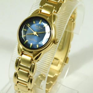 Horloges - MONTRE PHILIP PERSIO ALARM CHRONO A REPARE