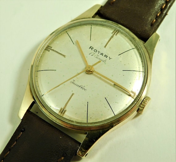 Solid gold rotary watch sale