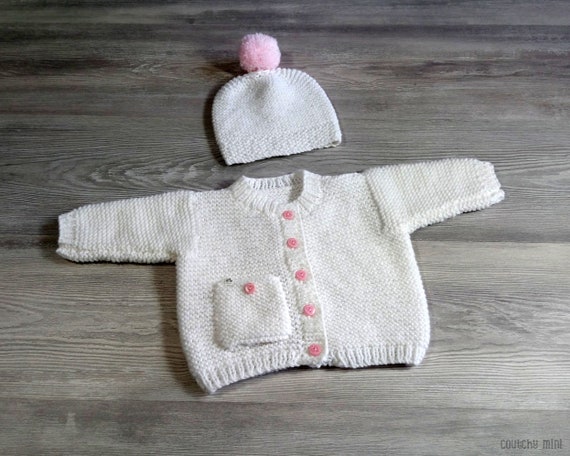 white knitted cardigan baby girl