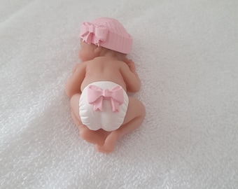 Handmade Ooak polymer fimo clay sleeping baby cake topper, baby shower, dolls house bow hat pink