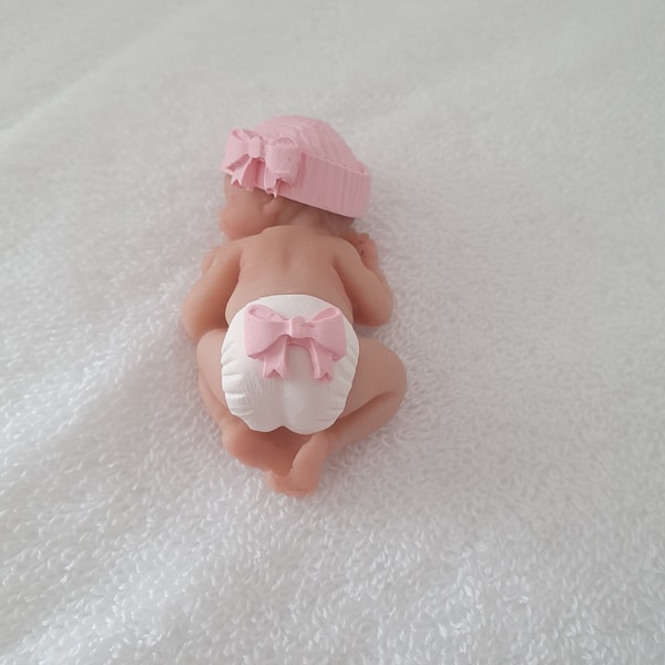 Handmade Ooak polymer fimo clay sleeping baby cake topper, baby shower, dolls house bow hat pink
