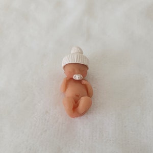 Handmade Ooak polymer fimo clay Tiny sleeping baby with a bobble hat and dummy/pacifer,  dolls house