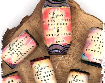 Handmade paper bead with quote - Love is the bridge between ...