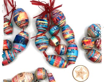 Rolled paper bead sets with coordinating word bead/s