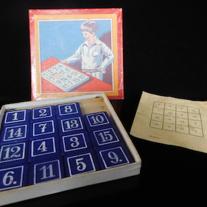 Juego de mesa, coleccionable, juego de cuadrados mágicos vintage, quince juegos, en caja de cartón original, con instrucciones de juego, juego alemán de los años 50