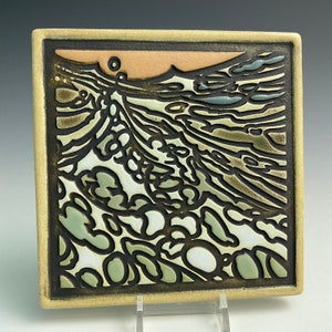 May include: A square ceramic tile with a black and white abstract design. The design features a swirling pattern of lines and shapes, with a hint of green and brown in the background.