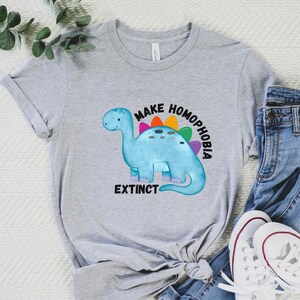 Make homophobia extinct Unisex Softstyle T-Shirt