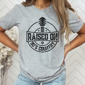Raised on 90s country music Unisex Softstyle T-Shirt