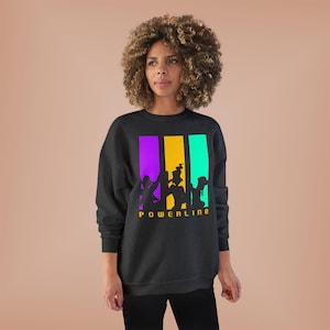 May include: Dark gray sweatshirt with a graphic of silhouetted figures in front of vertical purple, yellow, and teal stripes. The word "POWERLINE" is printed in yellow below the figures.