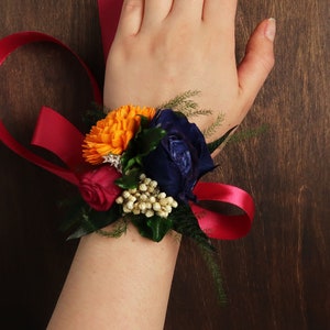 Colorful wrist corsage with sola flowers in yellow orange blue fuchsia pink, boho wedding, bridesmaid mothers flowers preserved greenery