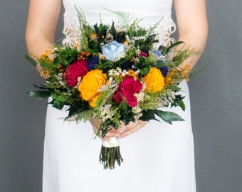 Colorful vibrant wild wedding bouquet, sola flowers in yellow orange blue fuchsia pink, boho bridesmaid bouquet with preserved greenery