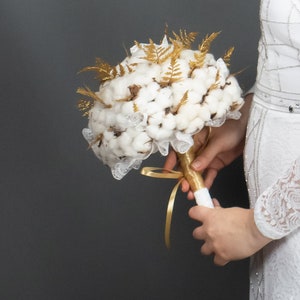 Natural organic raw cotton bolls and gold ferns winter wedding bouquet