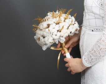 Natural organic raw cotton bolls and gold ferns winter wedding bouquet