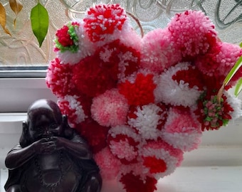 Hearts and flowers pom pom hanging.