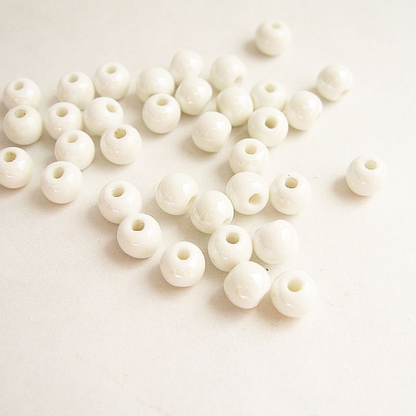 Lot de 10 ou 30 perles porcelaine céramique ronde blanc 6mm