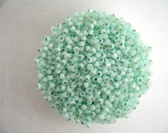 Lot of 8g Toho glass seed beads peridot green 6/0 4mm