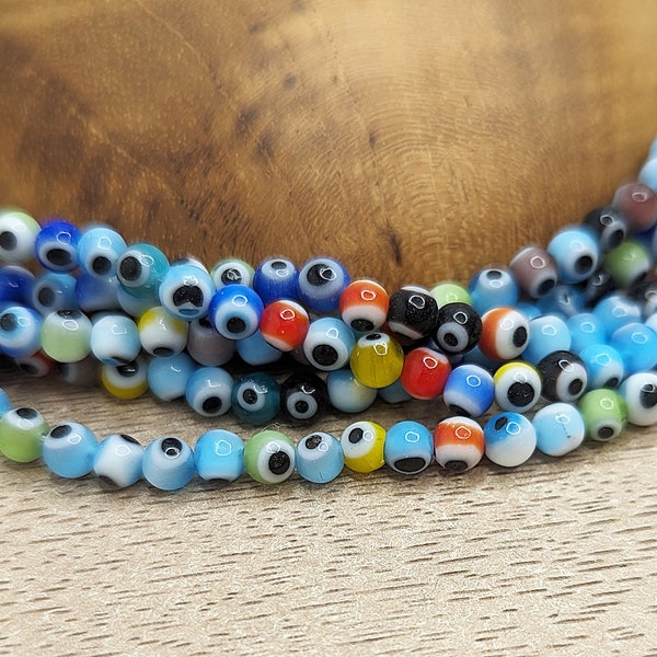 Perles de verre lampwork protection mauvais oeil multicolore rond 4mm Fil de 36cm