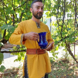 Pagan viking medieval shirt with thematic ribbon.Old ages outfit/costume.