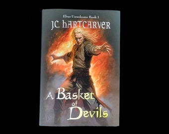 A Basket of Devils by J.C. Hartcarver / Elves Unwelcome book 1 Official AUTOGRAPHED Hardback book Dark Fantasy novel BENEFITS CHARITY!