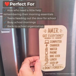 May include: A rectangular light-colored wooden magnet with rounded corners featuring laser-engraved text and icons. The text reads: AMIR GOT EVERYTHING? COMPUTER, CHARGER, WATER, PHONE, BIKE LOCK, LUNCH, LOCK UP, DON'T FORGET! with corresponding icons.